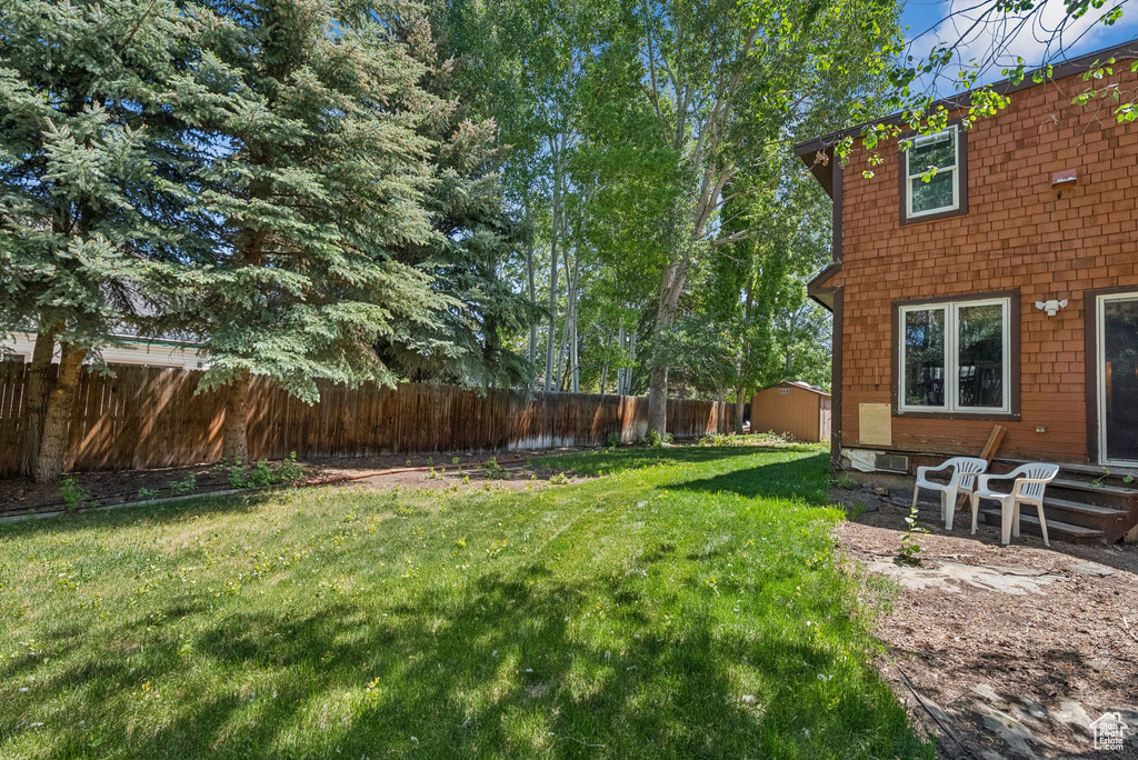 View of fenced backyard