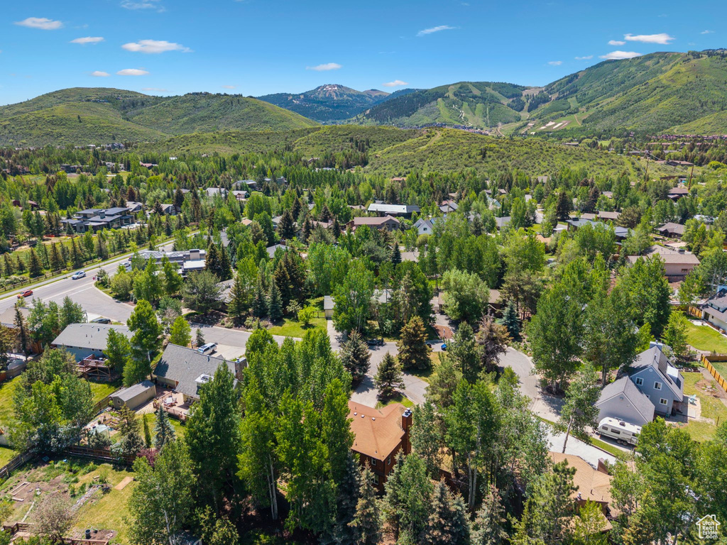 Aerial view of residential area featuring mountains