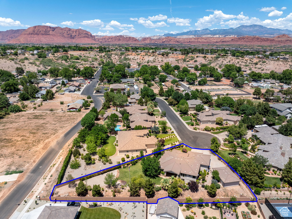 Aerial perspective of suburban area with mountains