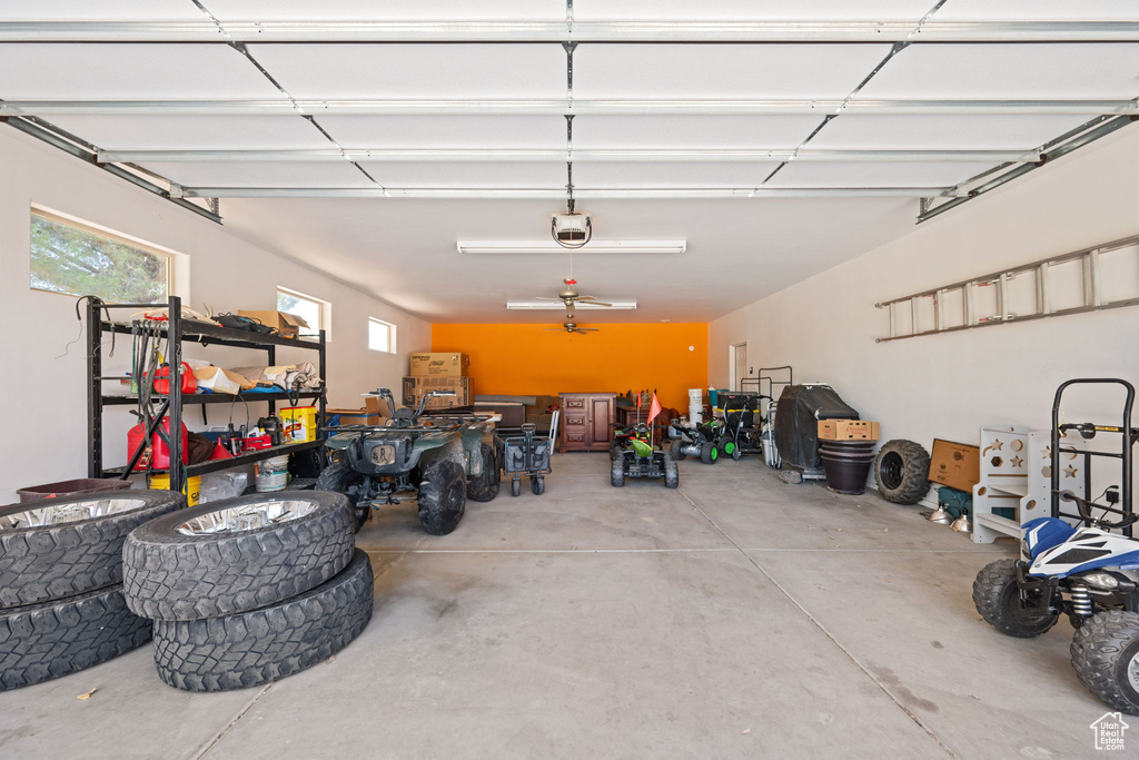 Garage featuring a garage door opener