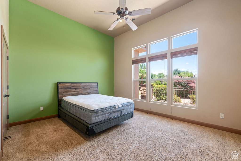 Bedroom featuring carpet flooring and ceiling fan