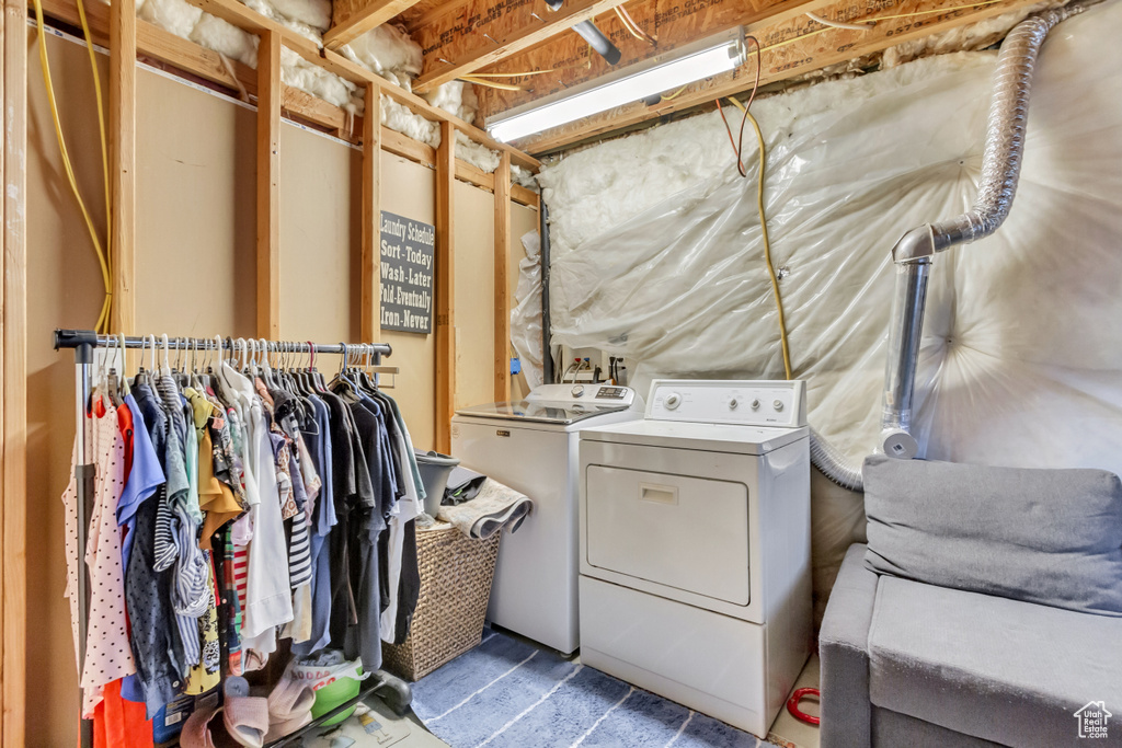 Laundry room featuring washing machine and dryer
