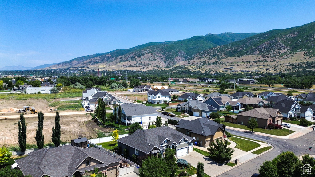 Aerial perspective of suburban area featuring mountains