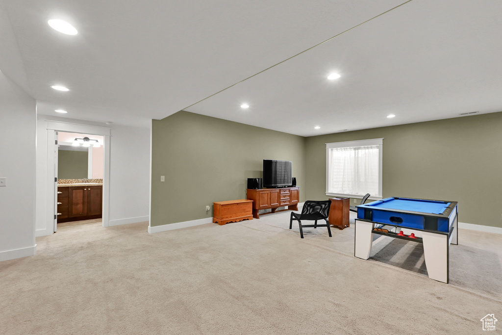 Playroom with light colored carpet and recessed lighting