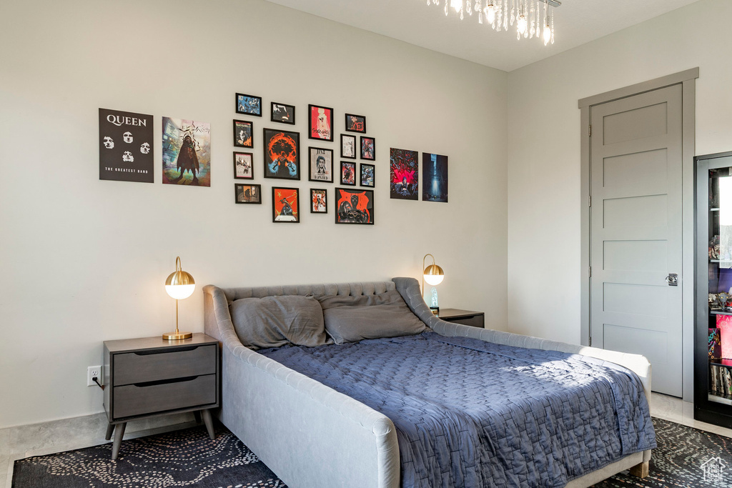 Bedroom featuring a chandelier