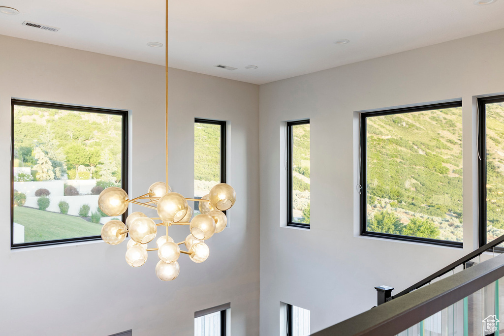 Detailed view of a chandelier and recessed lighting