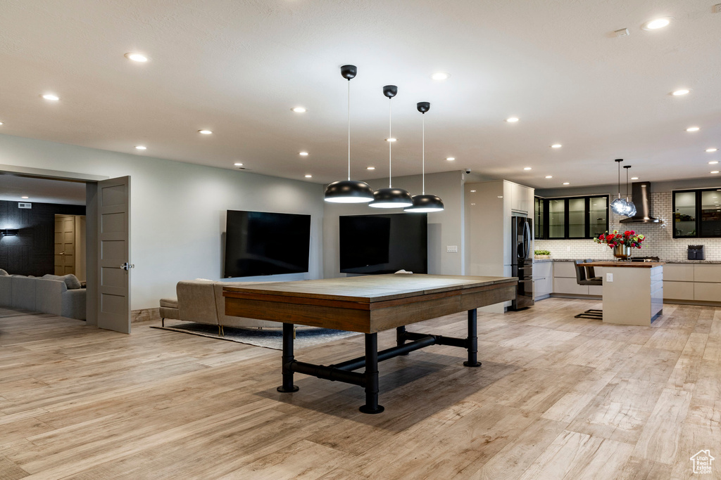 Playroom featuring light wood-style floors and recessed lighting