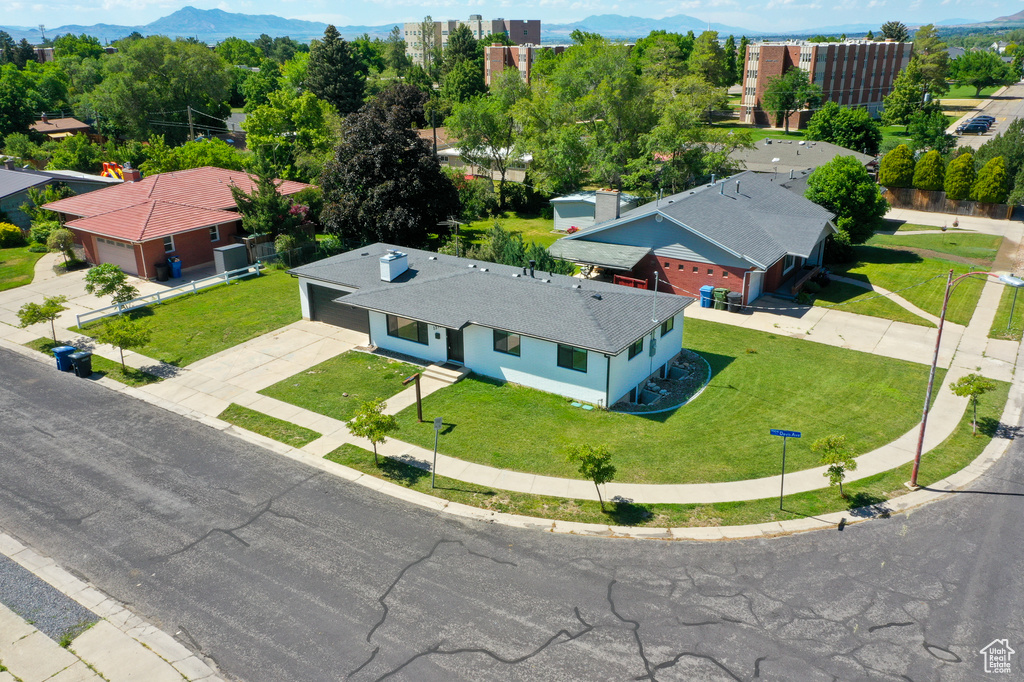 View of subject property with mountains