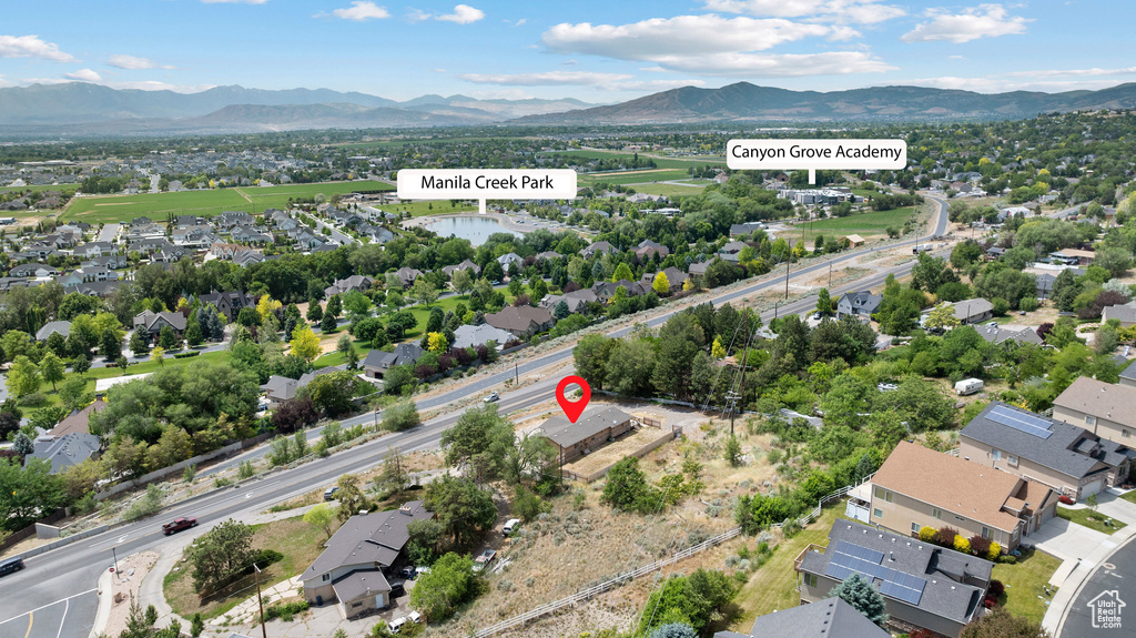 Aerial perspective of suburban area with mountains