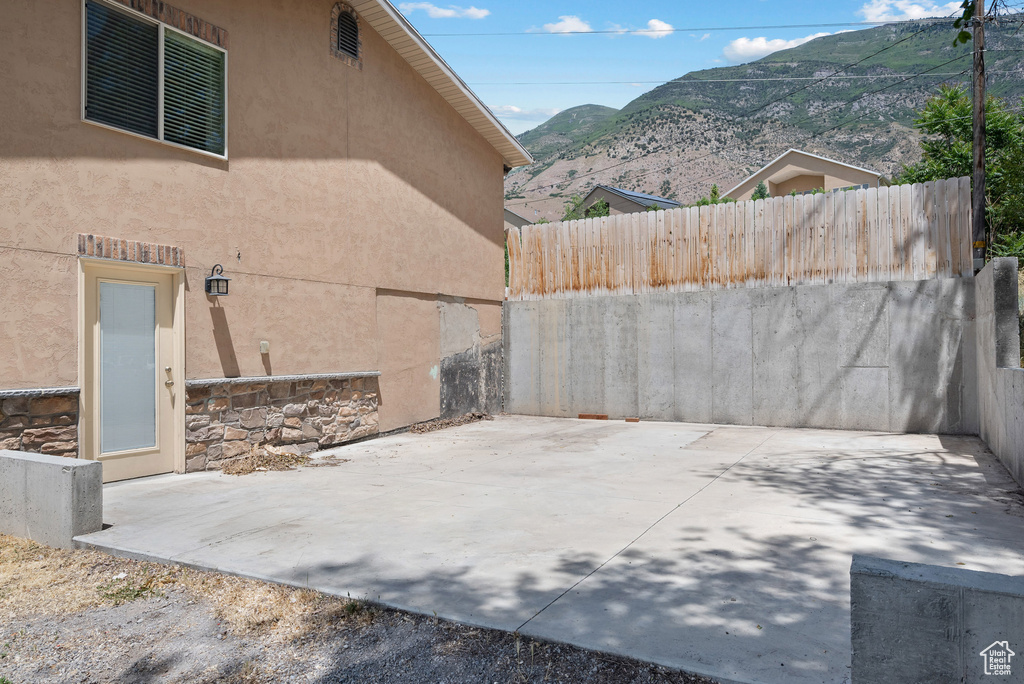 View of patio featuring a mountain view