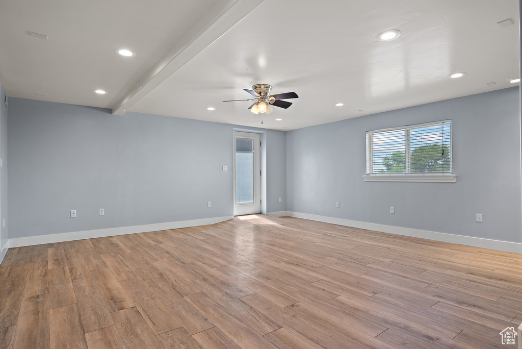 Unfurnished room featuring a ceiling fan, light wood-style floors, and recessed lighting