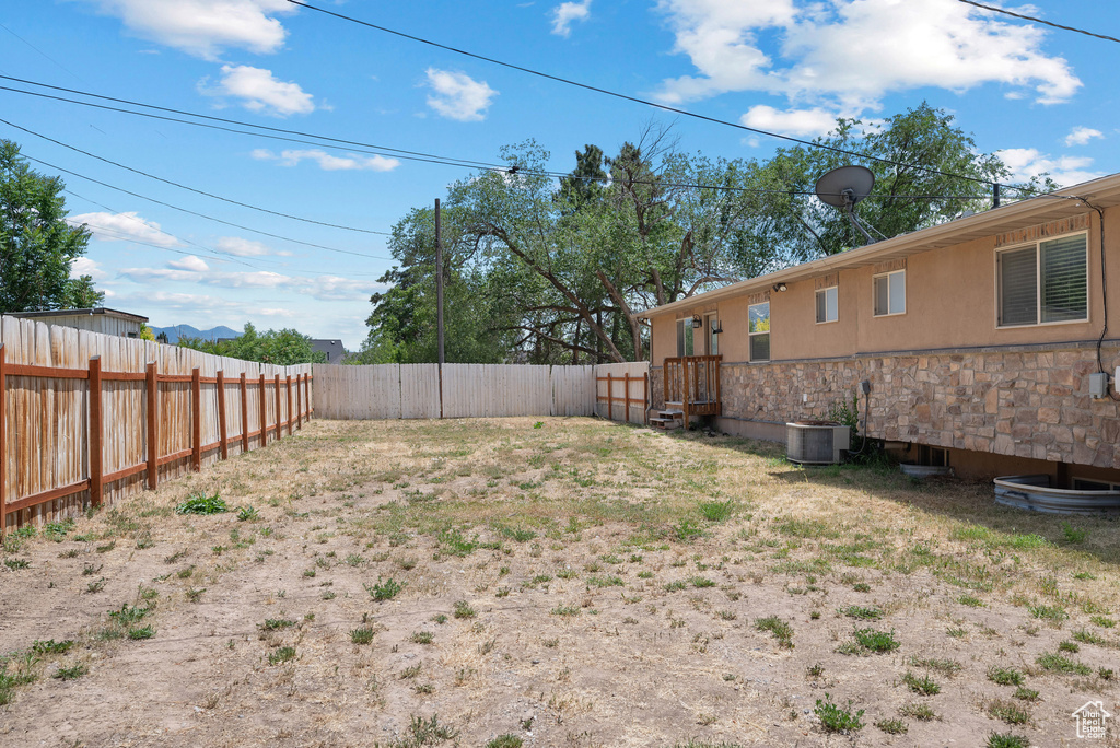 View of fenced backyard