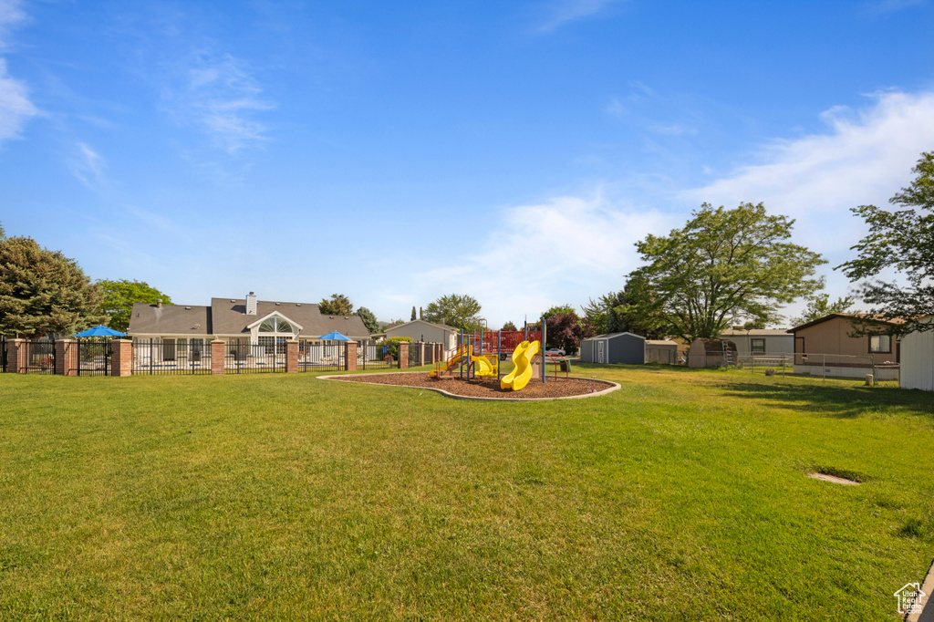 View of yard with a playground