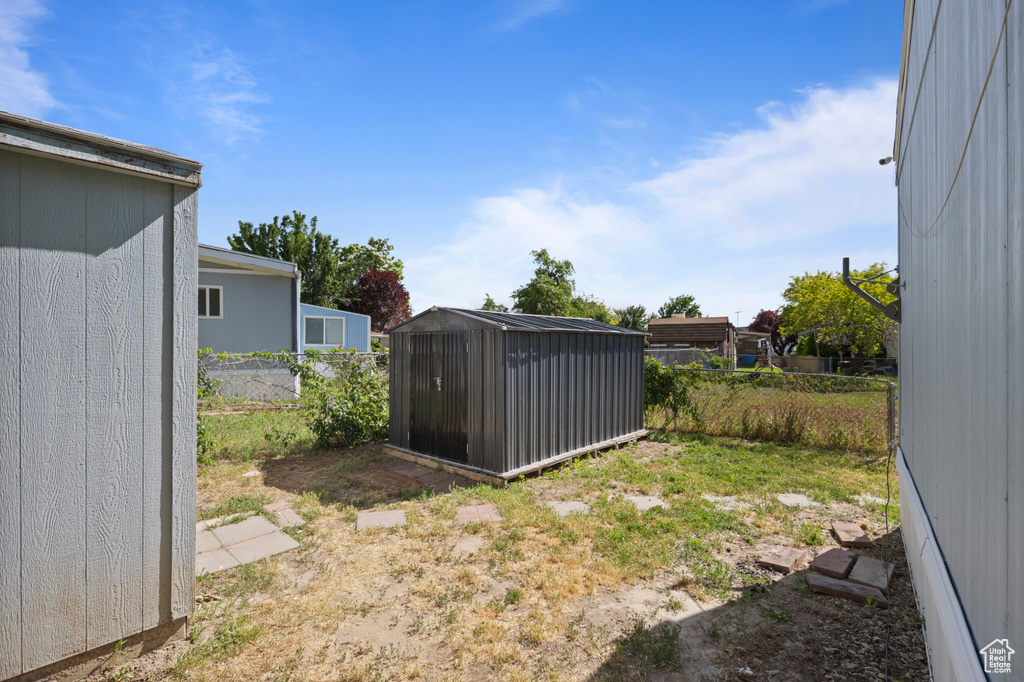 View of fenced backyard
