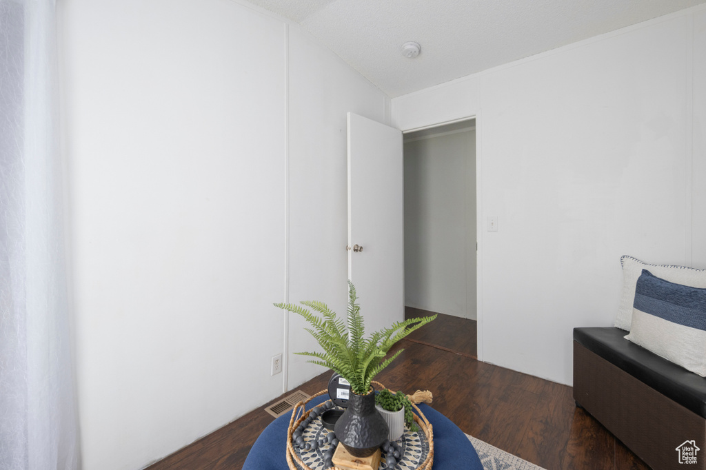 Sitting room featuring wood finished floors