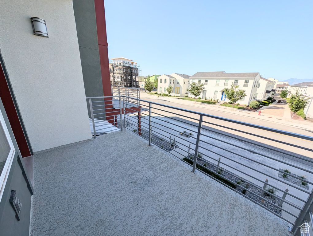 Balcony featuring a residential view
