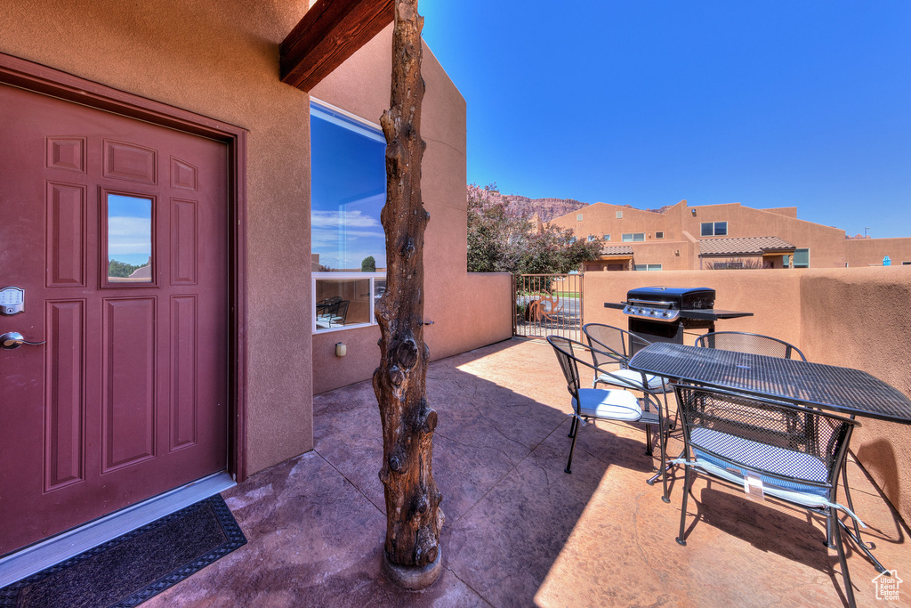 View of patio featuring outdoor dining area