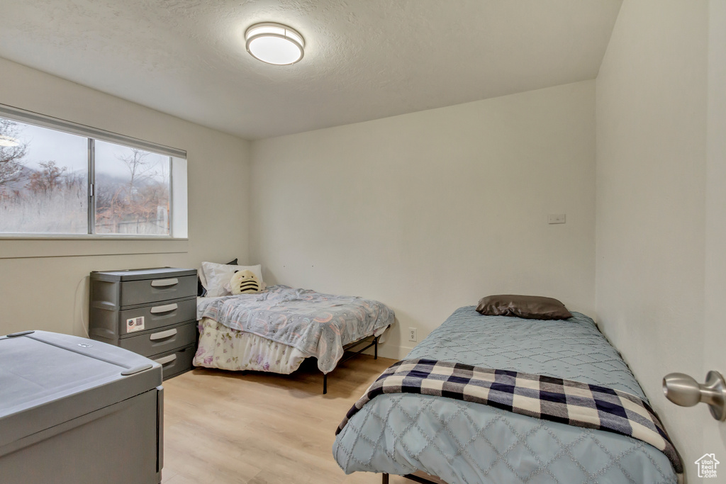 Bedroom featuring light wood-style flooring