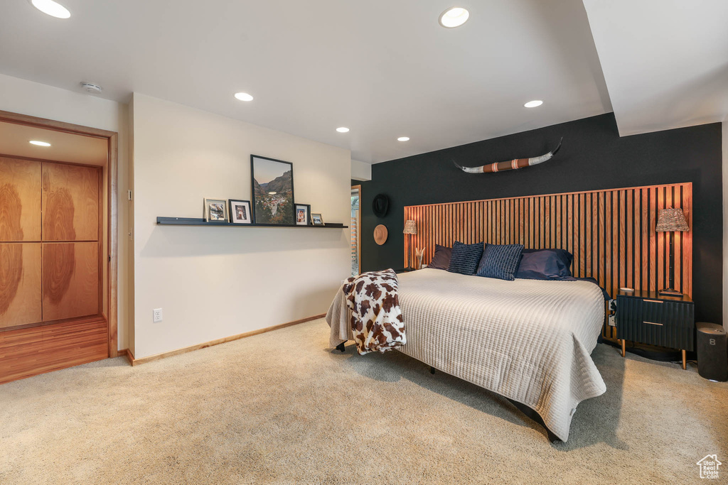 Bedroom featuring recessed lighting and carpet