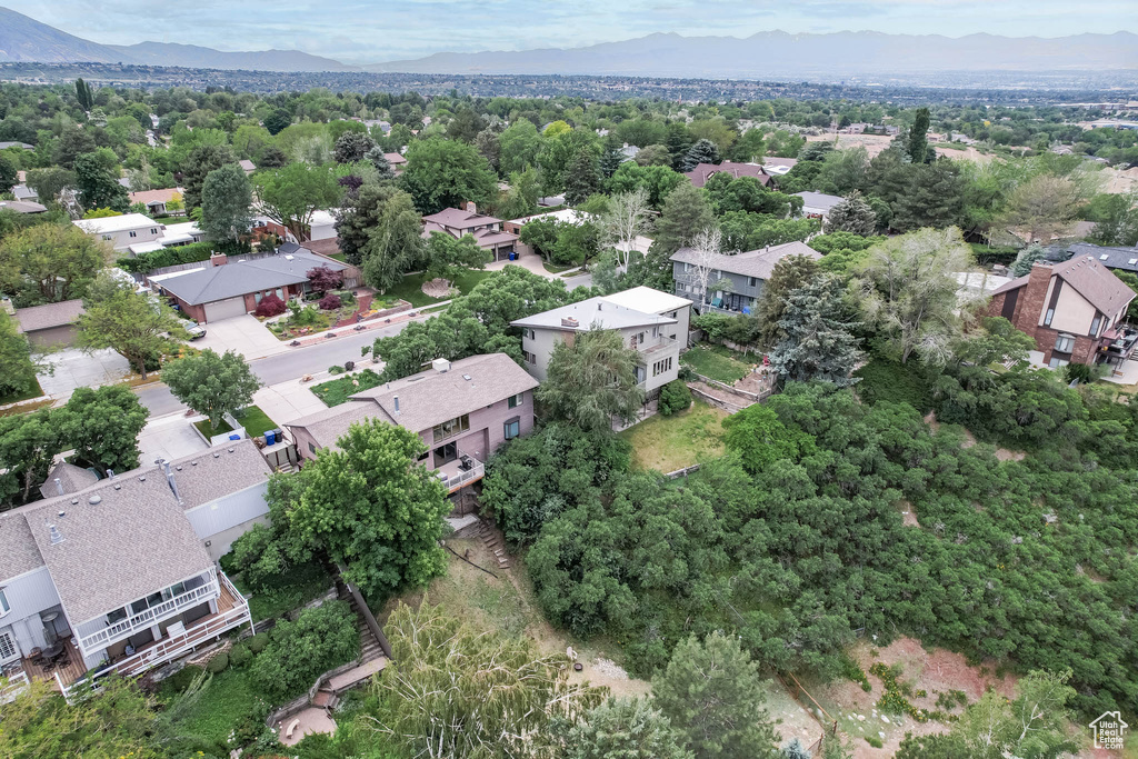 Aerial view of residential area with mountains