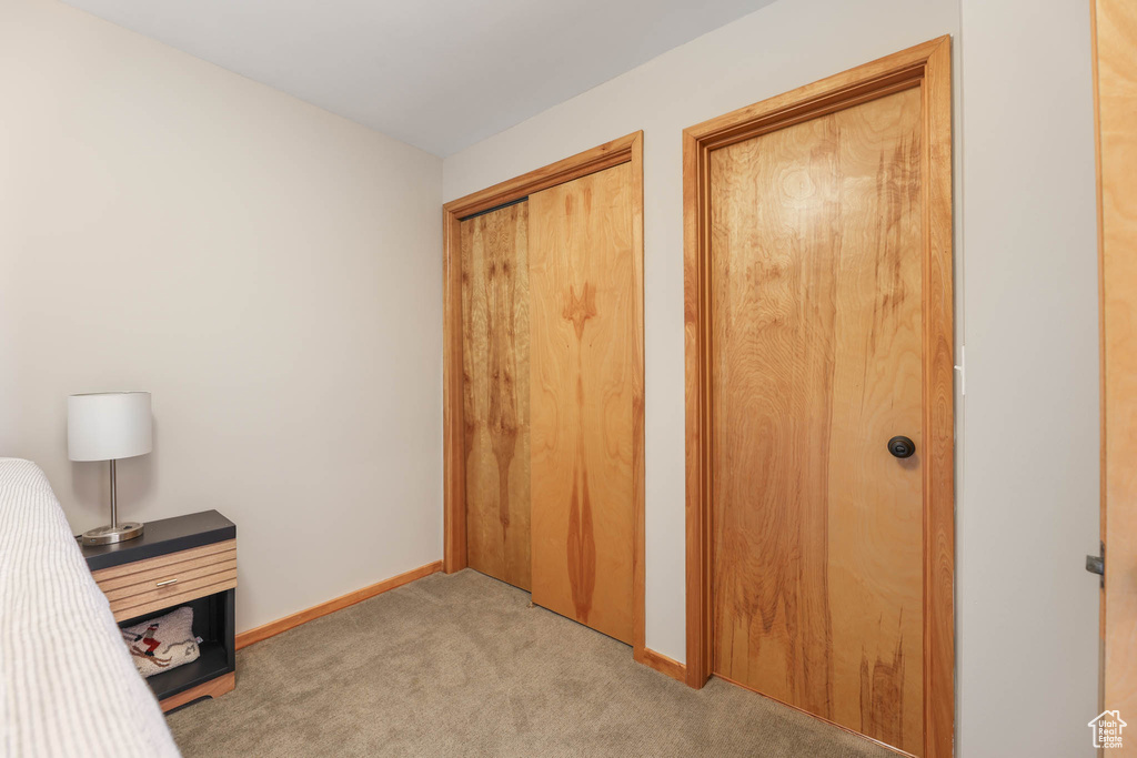 Unfurnished office featuring carpet flooring and baseboards