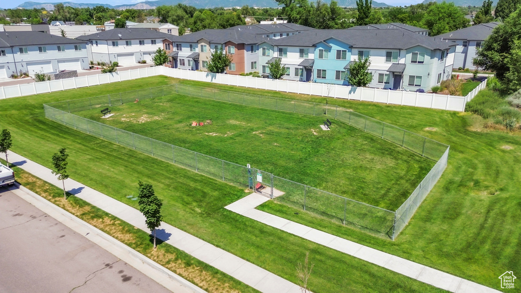Aerial perspective of suburban area with a mountain backdrop