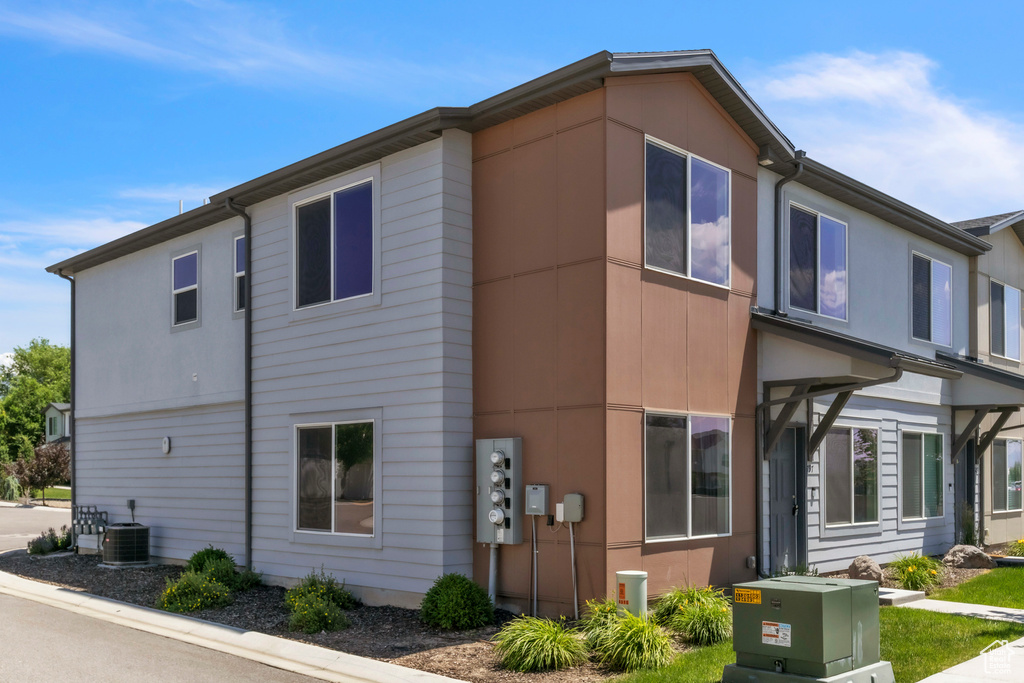 View of home\\\'s exterior featuring a central air condition unit
