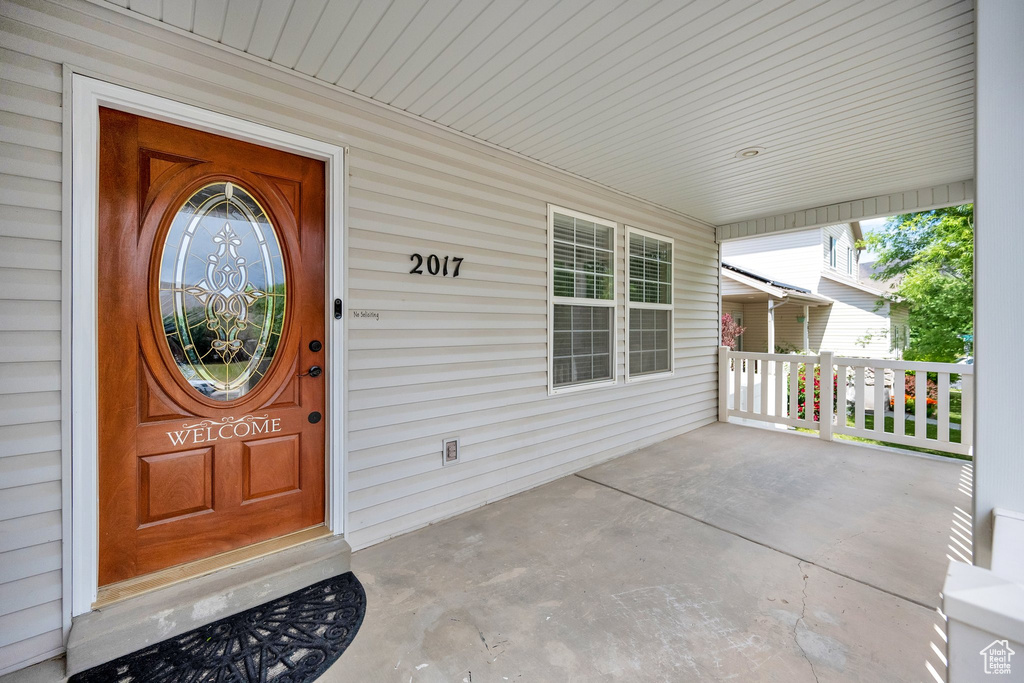 Entrance to property with covered porch