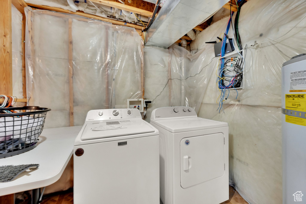 Washroom featuring washer and clothes dryer