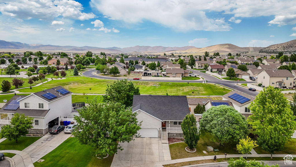 Aerial view of residential area with a mountain backdrop