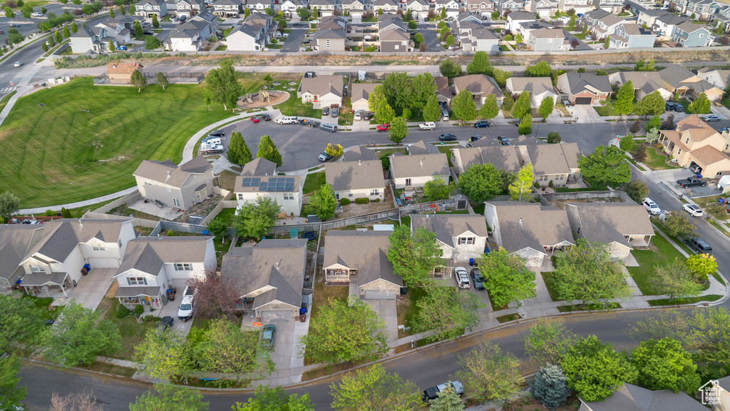 Aerial view of property's location featuring nearby suburban area