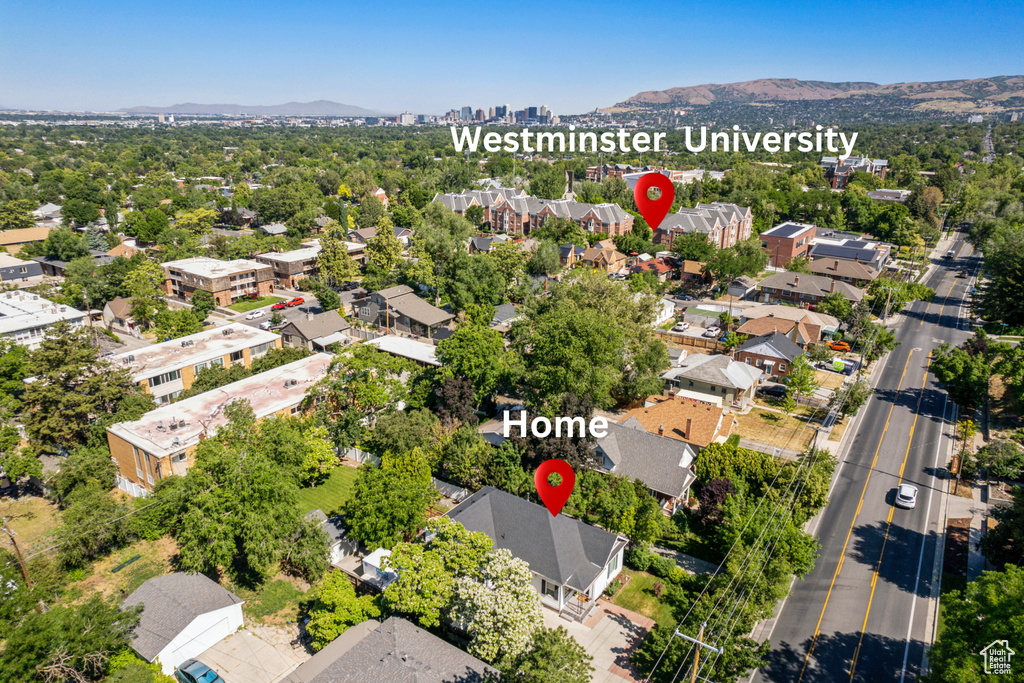 Aerial view of residential area with a mountain backdrop