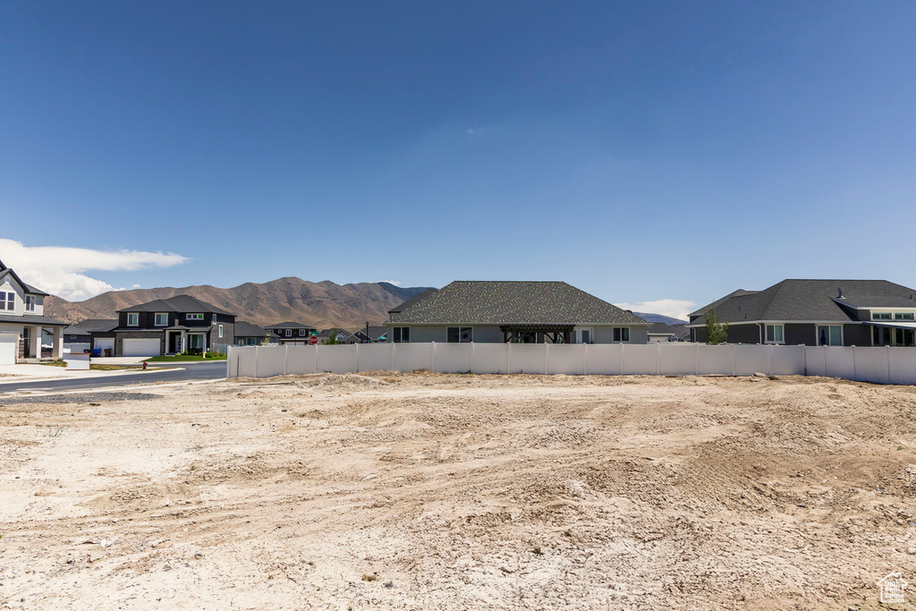 View of yard with a mountain view and a residential view