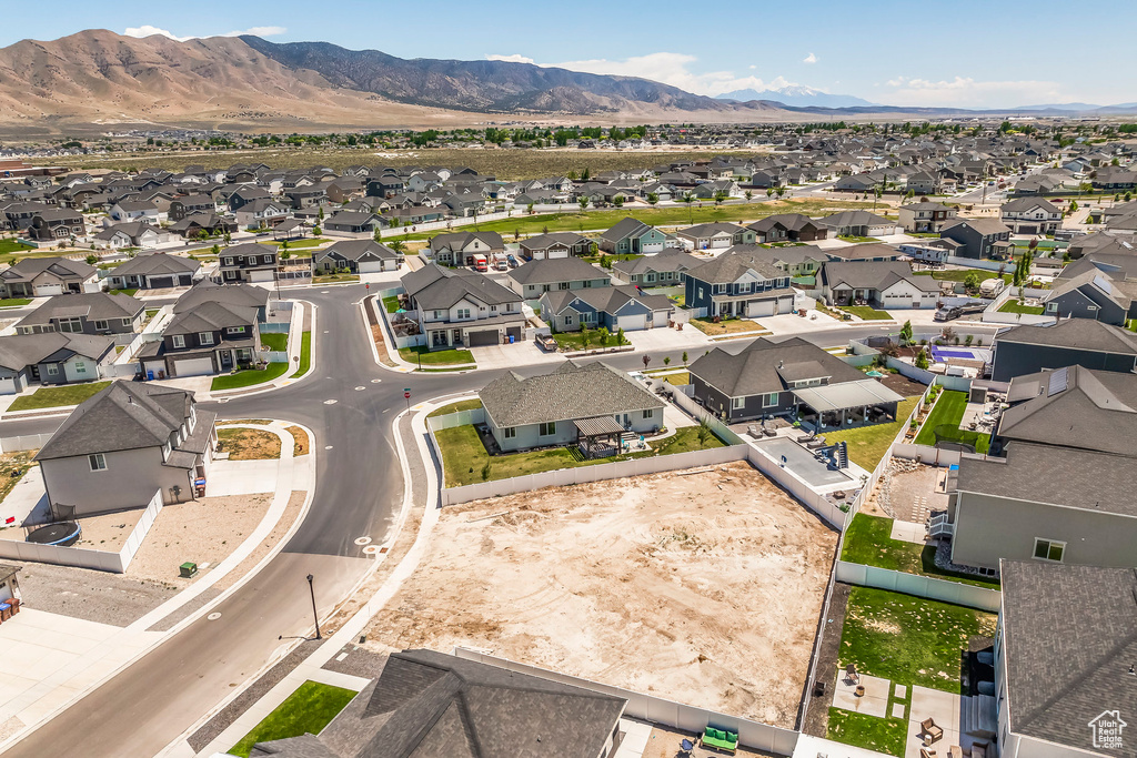 Aerial view of residential area with a mountain backdrop