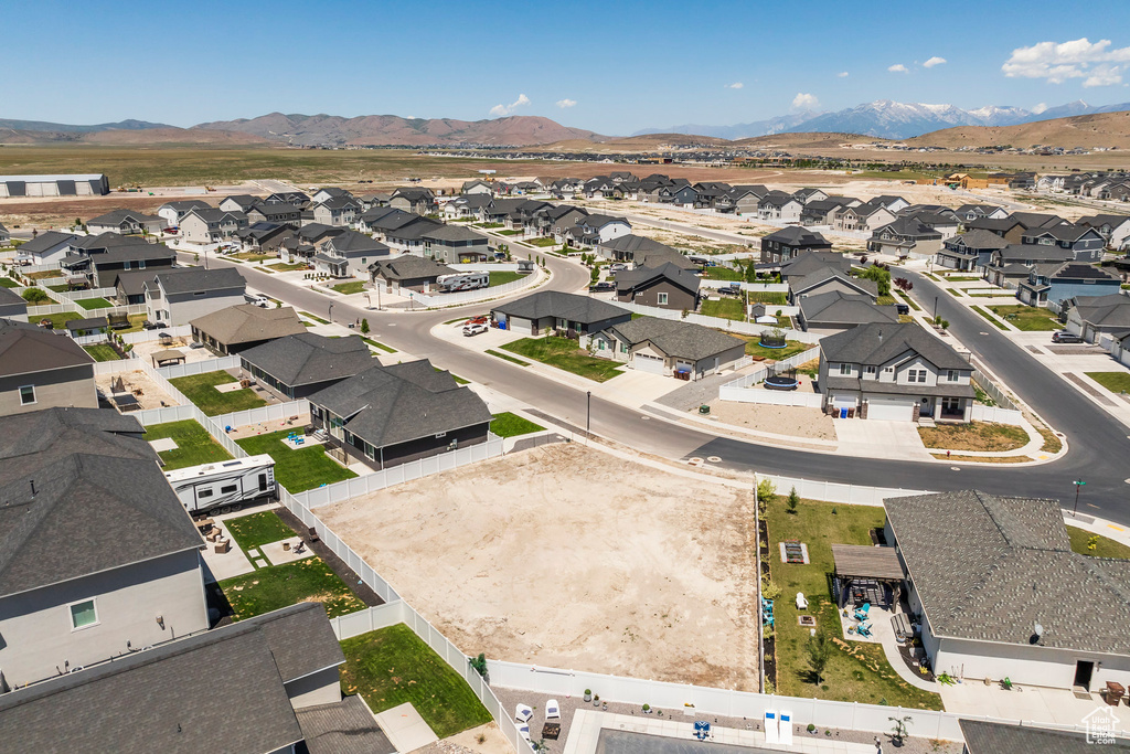 Aerial view of residential area with mountains