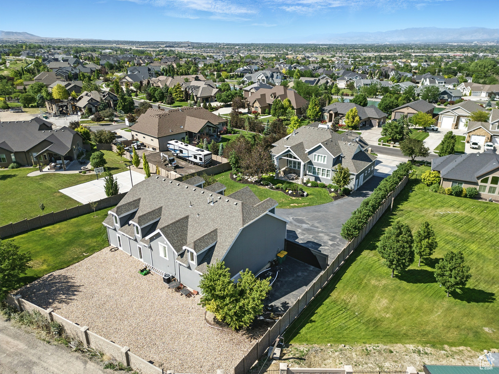Aerial view of residential area with a mountainous background