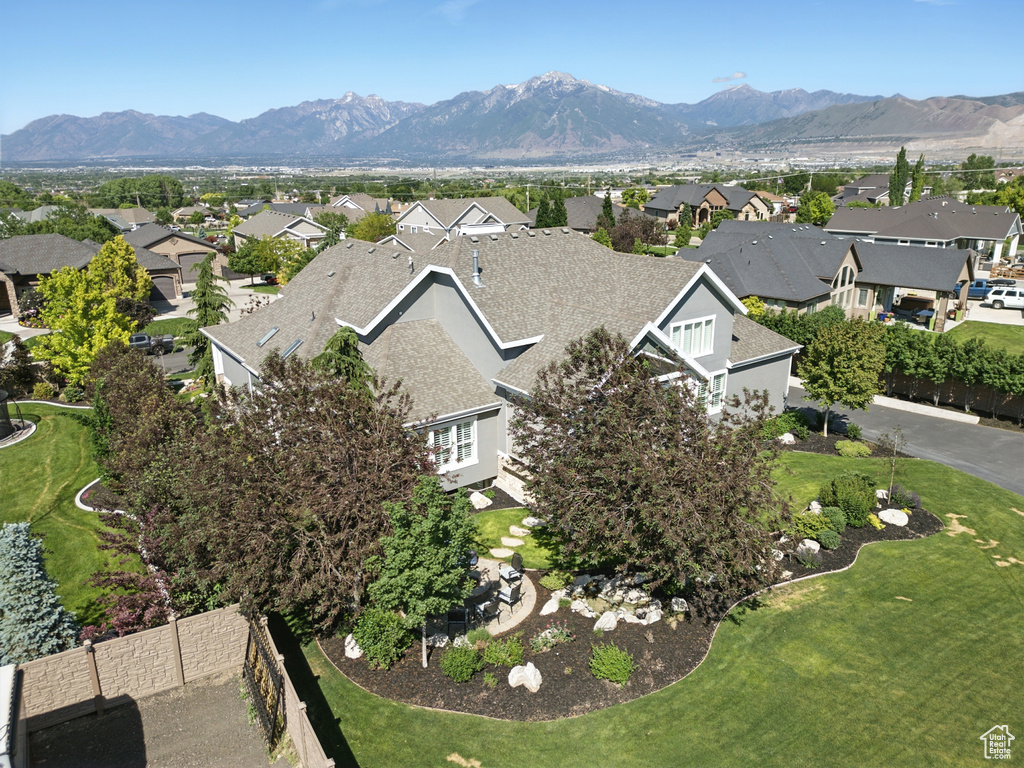 View of property location featuring nearby suburban area and mountains