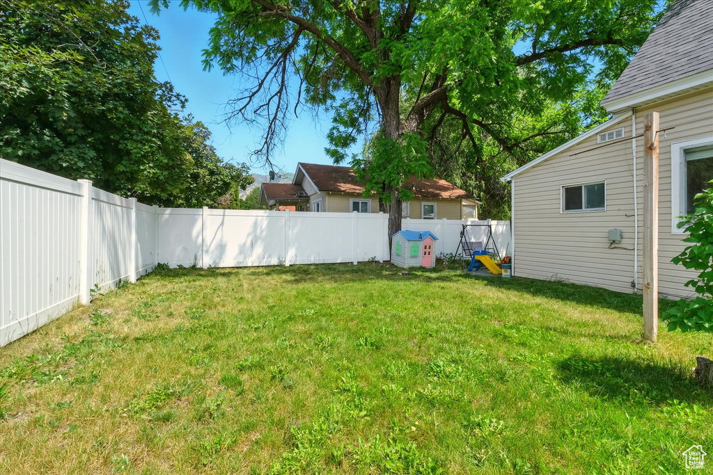 View of fenced backyard