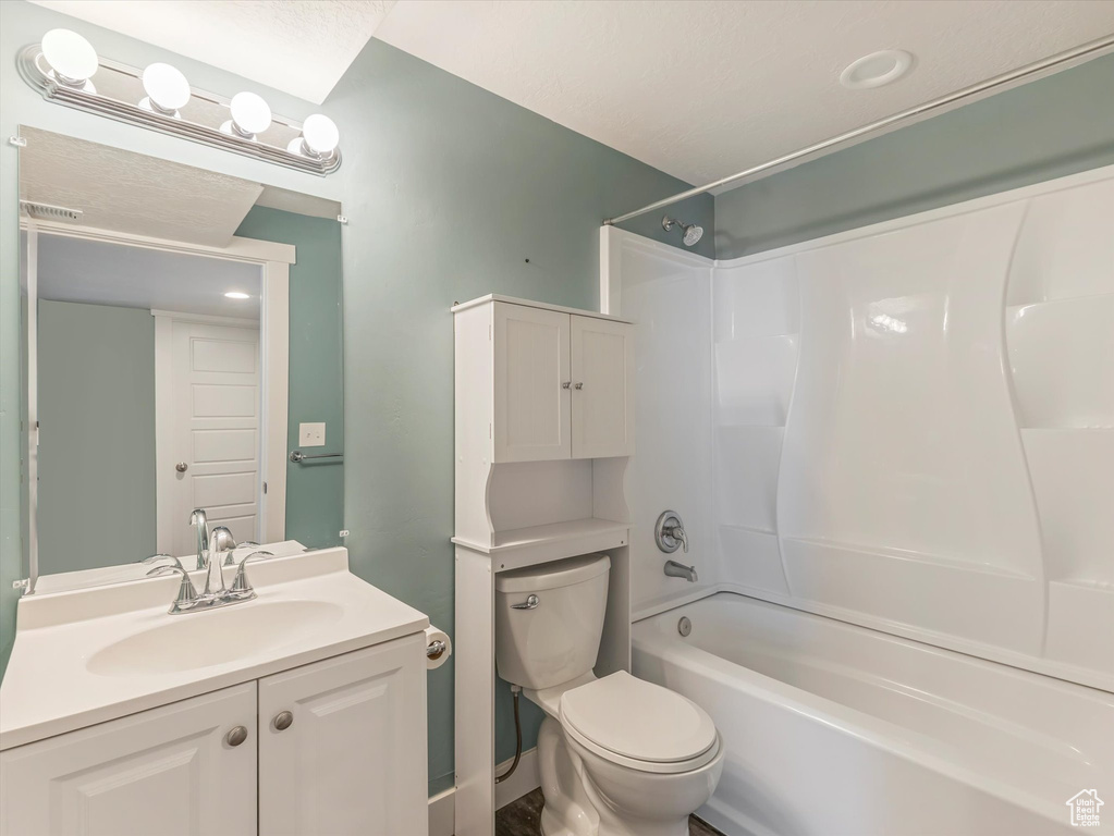 Bathroom featuring vanity and tub / shower combination