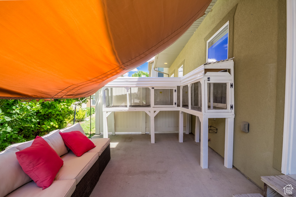 View of patio with outdoor lounge area