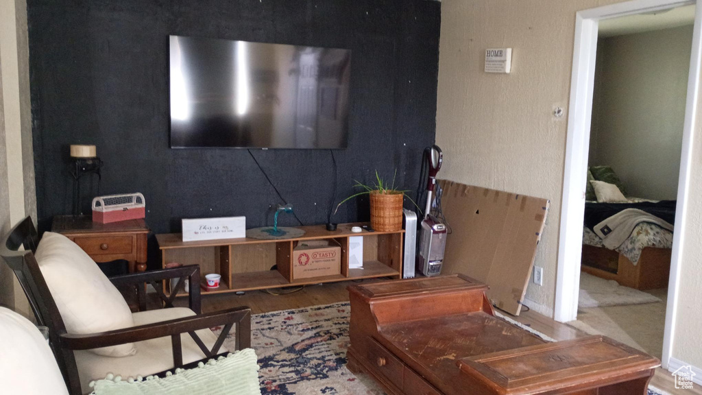 Living room featuring wood finished floors