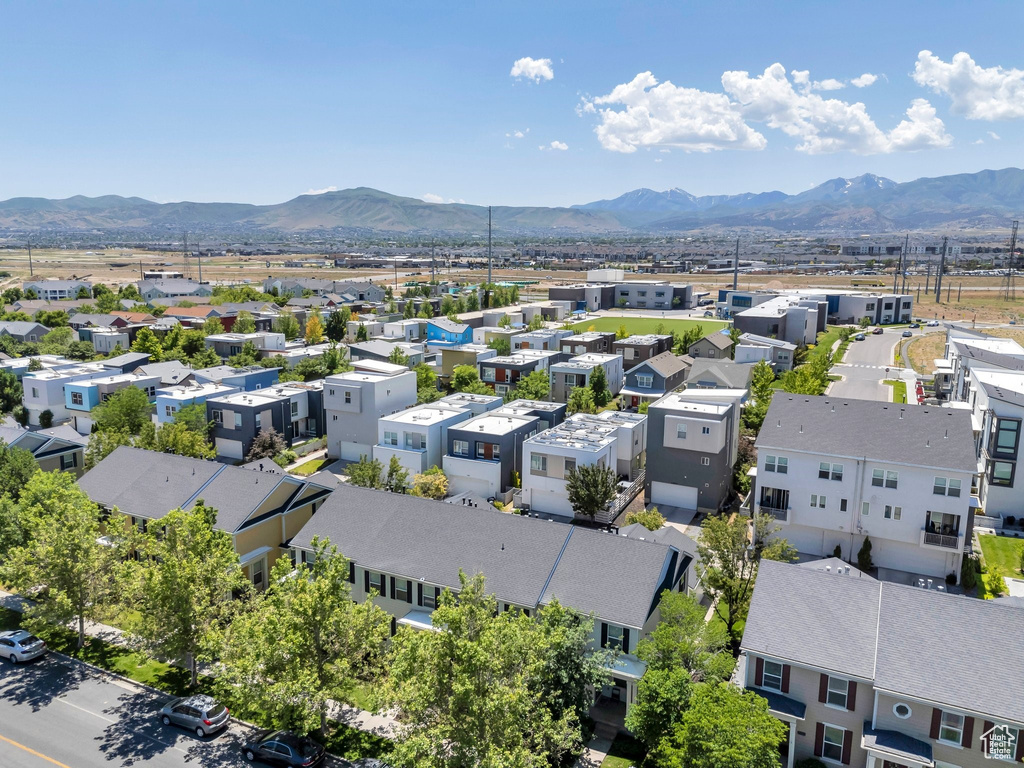 Aerial view of residential area featuring mountains