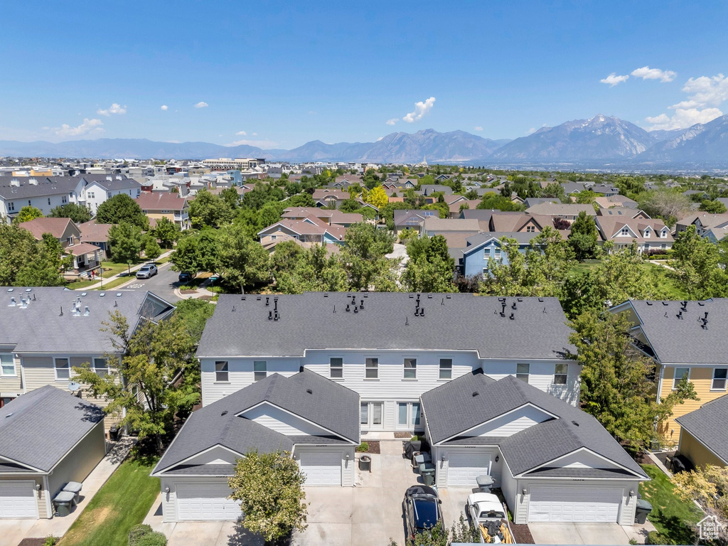 Aerial view of residential area with a mountainous background