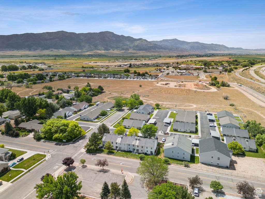 Aerial view of residential area with a mountain backdrop