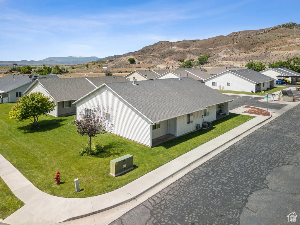 Aerial view of residential area with a mountainous background