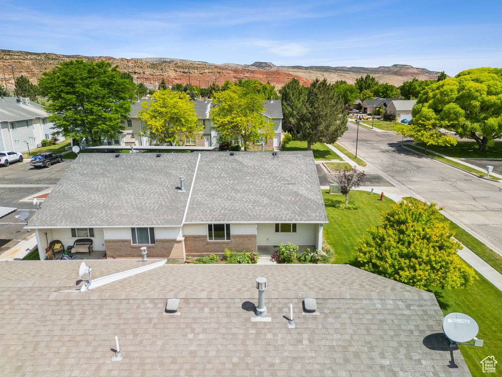 View from above of property featuring a mountainous background