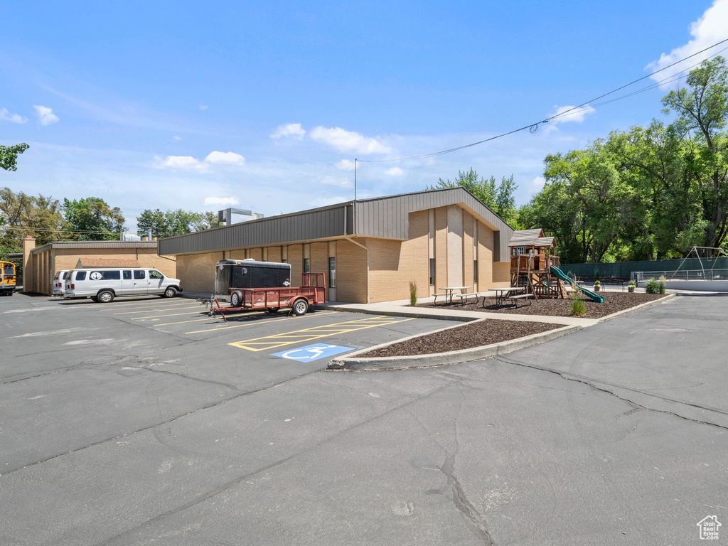 View of home\\\\\\\'s exterior with uncovered parking