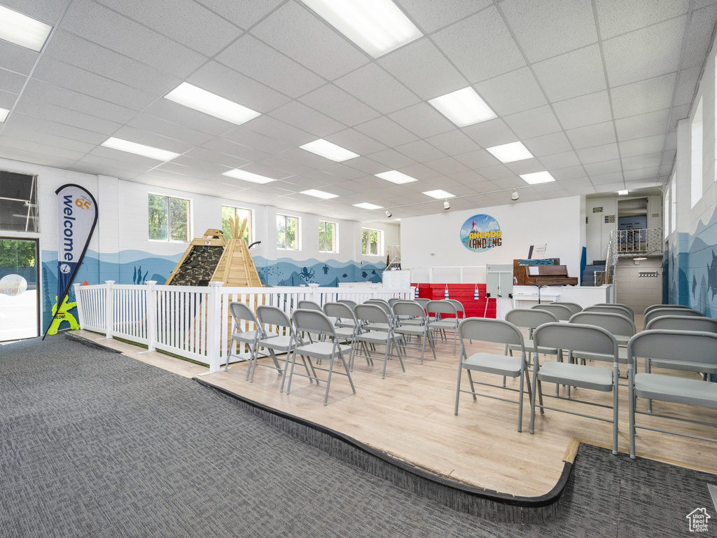Miscellaneous room with carpet floors and a drop ceiling