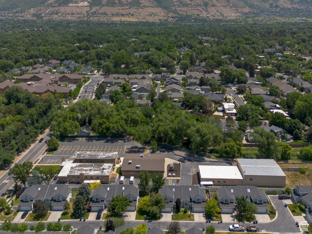 Aerial view of residential area featuring mountains