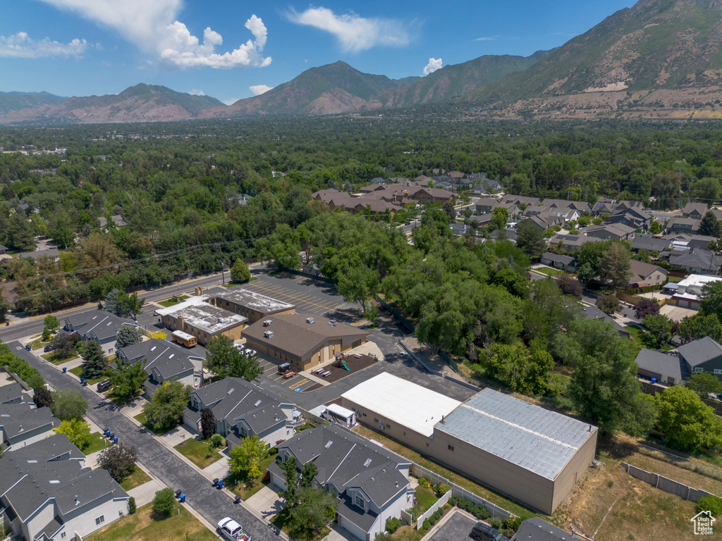 Aerial view of residential area with a mountain backdrop